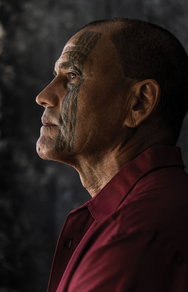 a person with a tattoo on his face