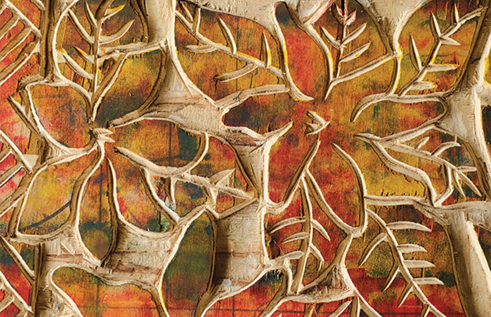 a close up of a carved wood