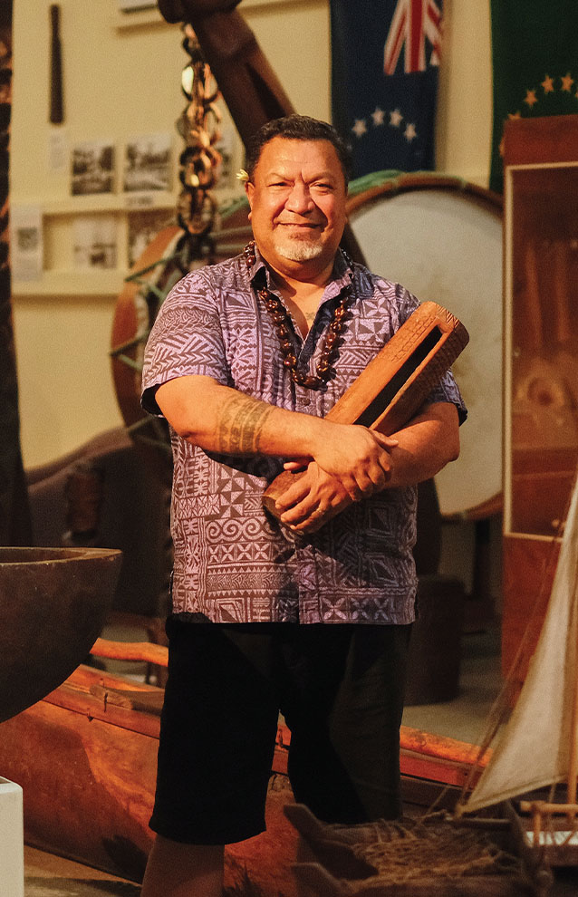 a person holding a wooden object