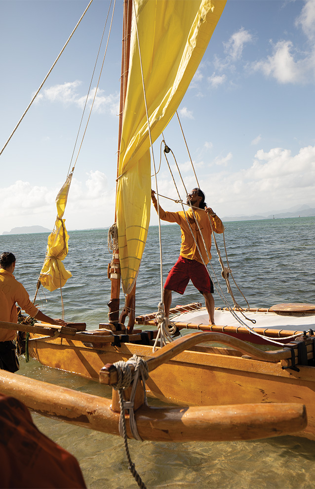 closeup of a person on a boat in the middle of the ocean