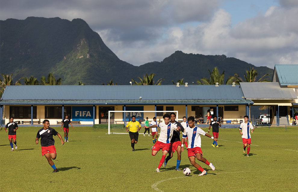 people playing football on the field