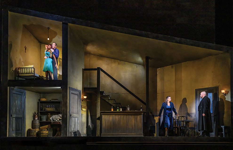 play set on stage with actors 